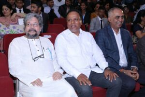 Mr. Nilesh Kulkarni, Mr. Ashish Shelar & Mr. Amol Gupte sitting together in hall.